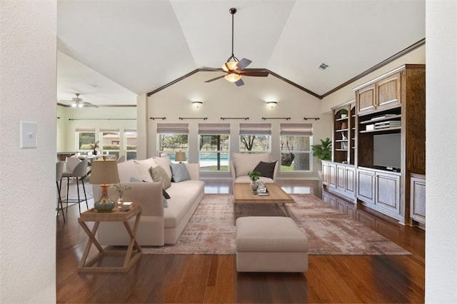 194 Brushy Creek Trl, Hutto, TX 78634 - living area featuring a ceiling fan, wood finished floors, healthy amount of natural light, and lofted ceiling