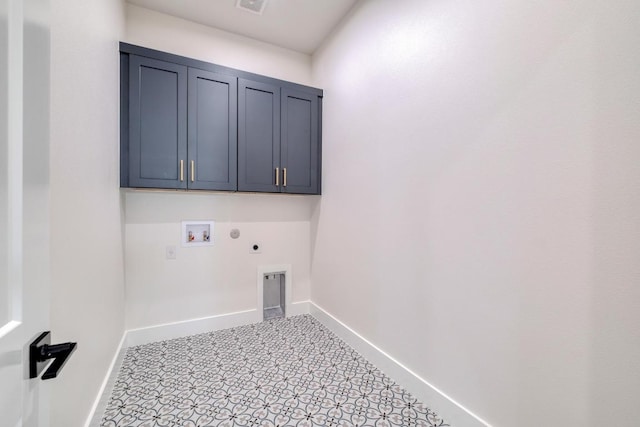 laundry room featuring hookup for an electric dryer, cabinet space, baseboards, gas dryer hookup, and hookup for a washing machine