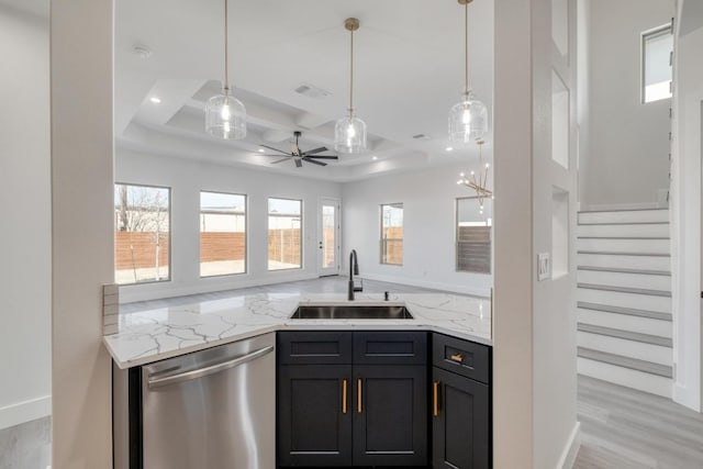 kitchen with visible vents, a sink, decorative light fixtures, light stone countertops, and dishwasher