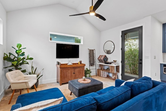 living room with vaulted ceiling, baseboards, and ceiling fan