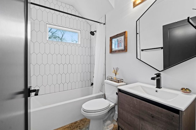 full bathroom with vanity, toilet, and shower / tub combo