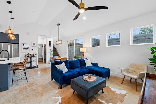 living area featuring baseboards, stairs, recessed lighting, high vaulted ceiling, and a ceiling fan