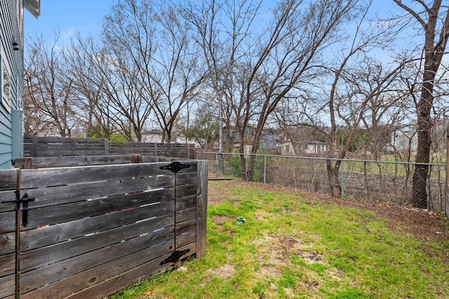 view of yard with fence