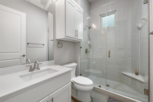2505 Moreno St, Austin, TX 78723 - bathroom with toilet, a stall shower, and vanity