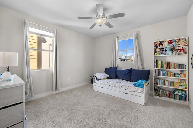 2505 Moreno St, Austin, TX 78723 - carpeted bedroom featuring ceiling fan and baseboards