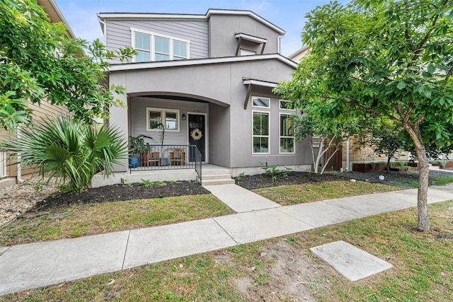 2505 Moreno St, Austin, TX 78723 - view of front facade with covered porch and stucco siding