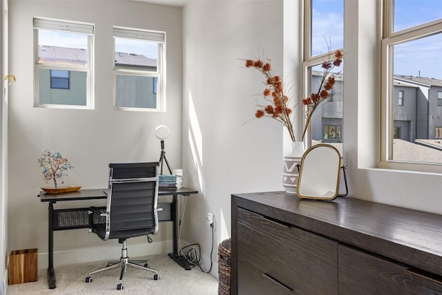 2505 Moreno St, Austin, TX 78723 - home office featuring healthy amount of natural light, baseboards, and carpet flooring