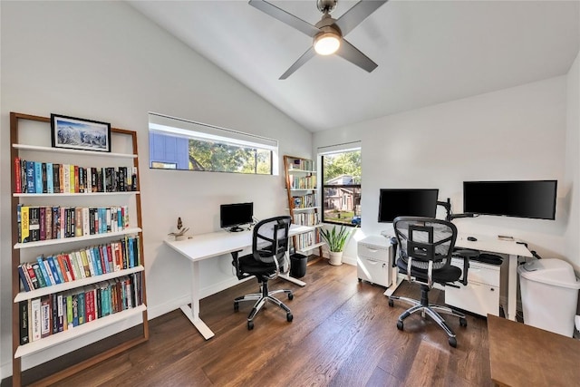 office featuring baseboards, wood finished floors, a ceiling fan, and vaulted ceiling