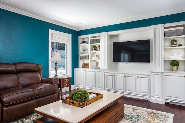 living area featuring built in shelves, dark wood-style flooring, and crown molding