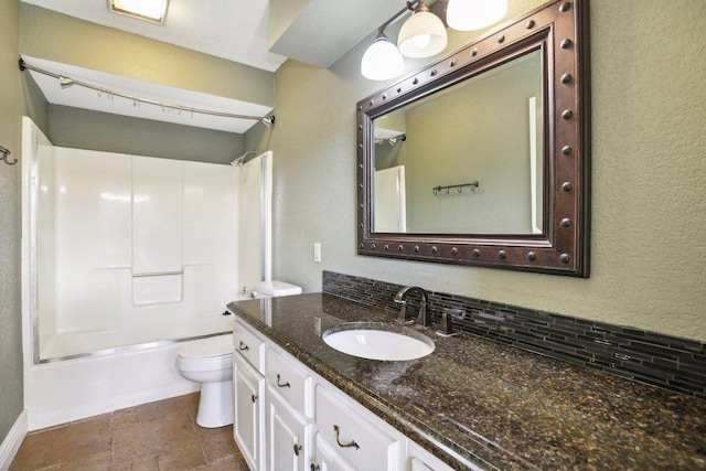 bathroom featuring shower / bathtub combination, toilet, vanity, and tasteful backsplash