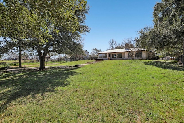 view of yard featuring fence