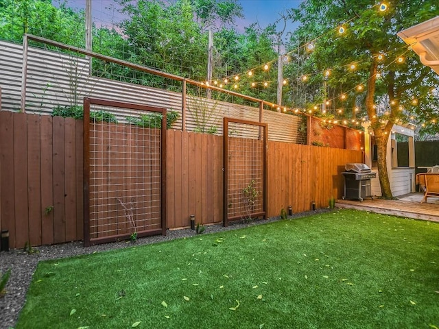 view of yard featuring a fenced backyard