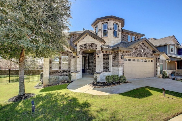 french country home featuring fence, concrete driveway, a front yard, a garage, and stone siding