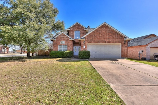 traditional-style home featuring a front yard, fence, concrete driveway, a garage, and brick siding