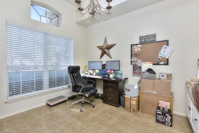 tiled office featuring baseboards and a chandelier