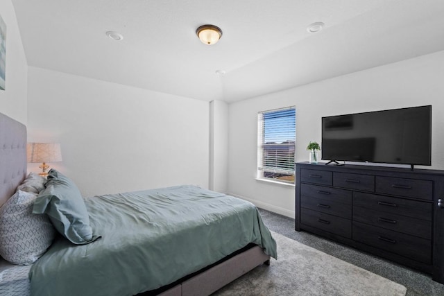 carpeted bedroom with baseboards