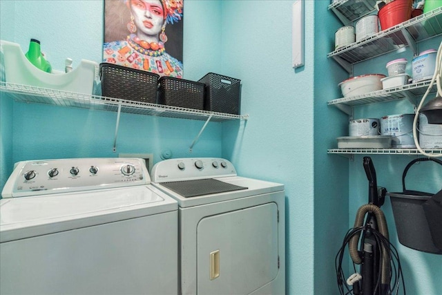 laundry area with washer and dryer and laundry area