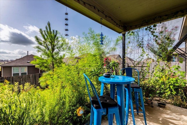 view of patio with fence