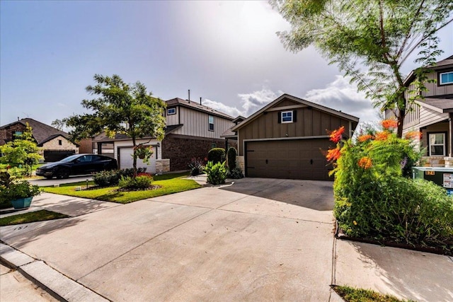 view of front of house featuring board and batten siding and concrete driveway