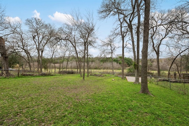 view of yard with fence