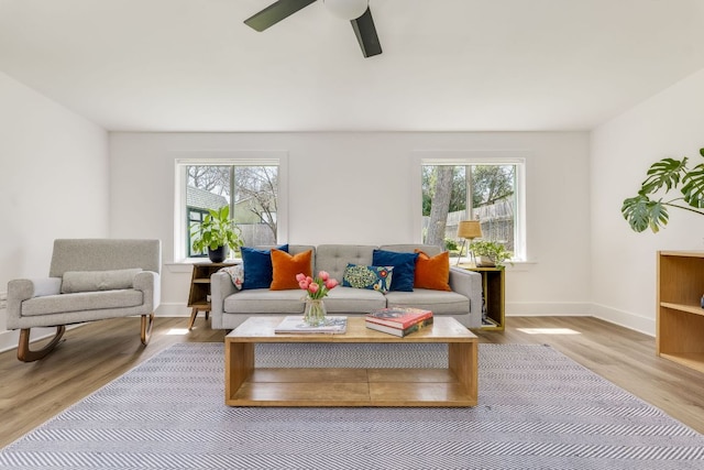 905 Turtle Creek Blvd, Austin, TX 78745 - living room with wood finished floors, a ceiling fan, and baseboards