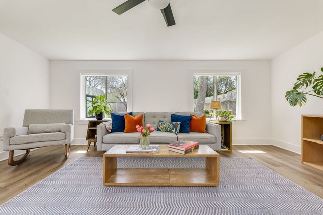 905 Turtle Creek Blvd, Austin, TX 78745 - living area with wood finished floors and a ceiling fan