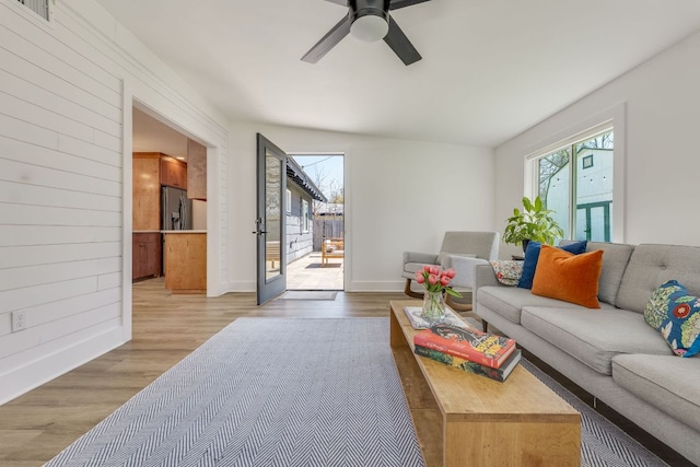 905 Turtle Creek Blvd, Austin, TX 78745 - living room featuring a ceiling fan, light wood-style flooring, and baseboards
