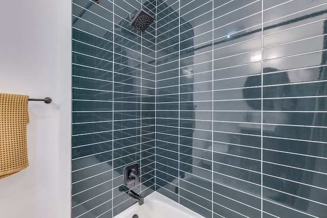 bathroom with shower / bath combination