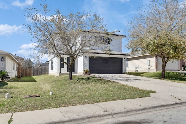 traditional-style house with driveway, an attached garage, a front lawn, and fence