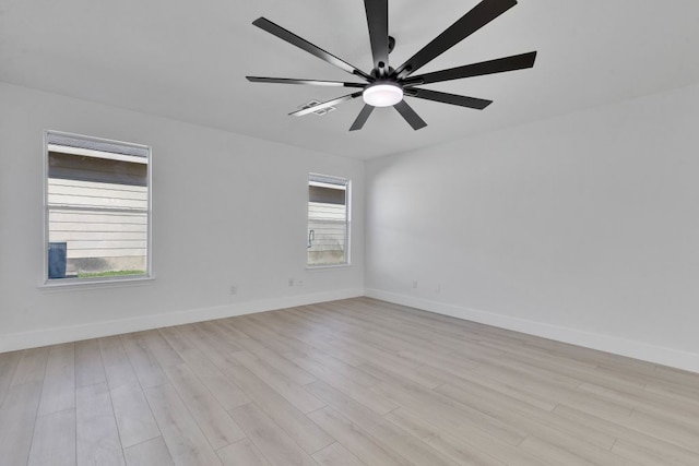 unfurnished room with light wood-type flooring, baseboards, and ceiling fan