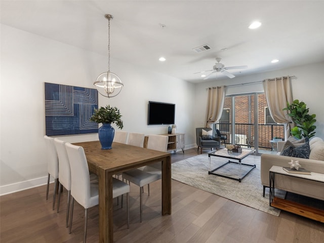 dining area featuring recessed lighting, wood finished floors, visible vents, and baseboards