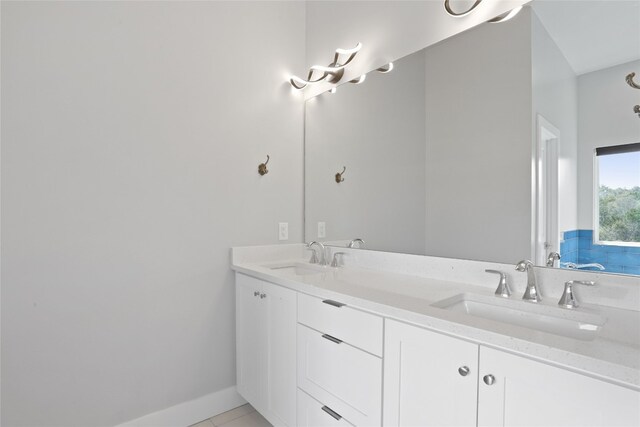 1503 Sharps Rd, Austin, TX 78734 - bathroom featuring double vanity and tile patterned floors