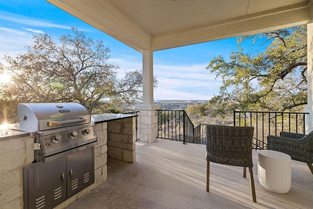 view of patio / terrace featuring a balcony and area for grilling