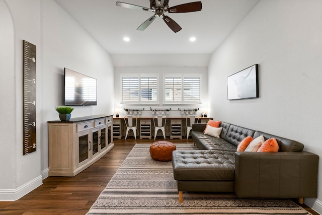 living room featuring vaulted ceiling, recessed lighting, a ceiling fan, and dark wood-style flooring