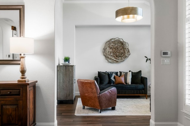 living room featuring dark wood finished floors and baseboards