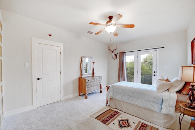 bedroom featuring visible vents, baseboards, access to exterior, and carpet flooring