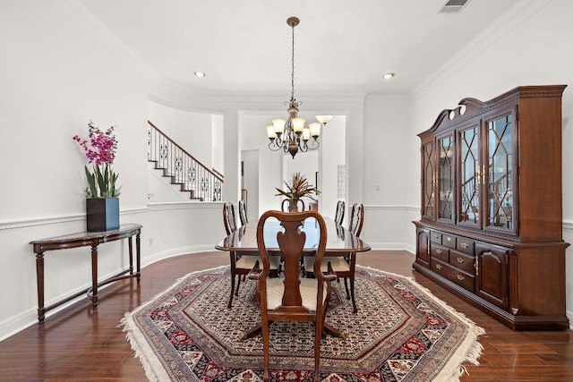 dining space with dark wood-type flooring, baseboards, a chandelier, stairway, and ornamental molding