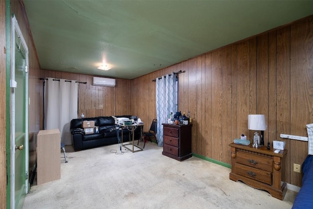 sitting room featuring wooden walls, a wall mounted AC, and carpet floors