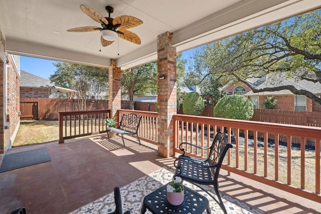 view of patio featuring a fenced backyard and ceiling fan