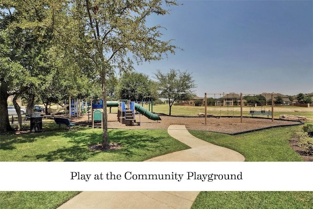 community play area with a yard