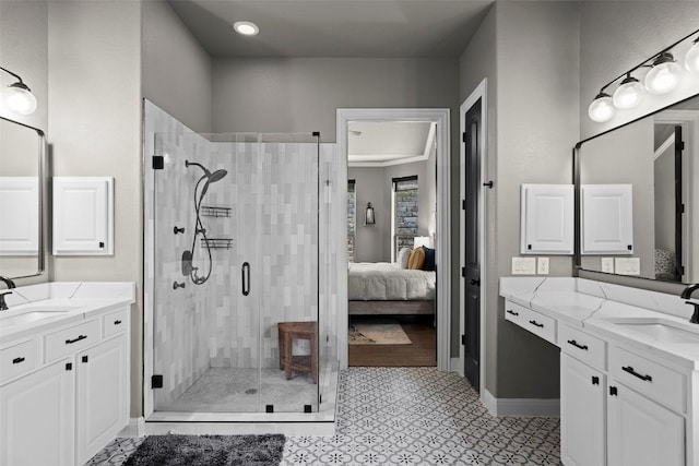 205 Varco Dr, Austin, TX 78738 - full bathroom with a shower stall, ensuite bath, and two vanities