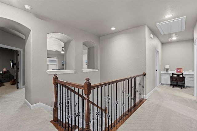 205 Varco Dr, Austin, TX 78738 - hallway featuring attic access, light carpet, an upstairs landing, recessed lighting, and arched walkways