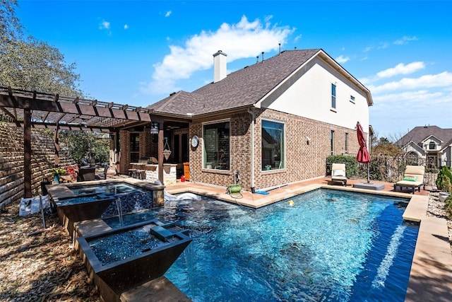 view of pool with a patio area, a pool with connected hot tub, a pergola, and fence