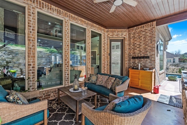 view of patio with an outdoor hangout area and ceiling fan