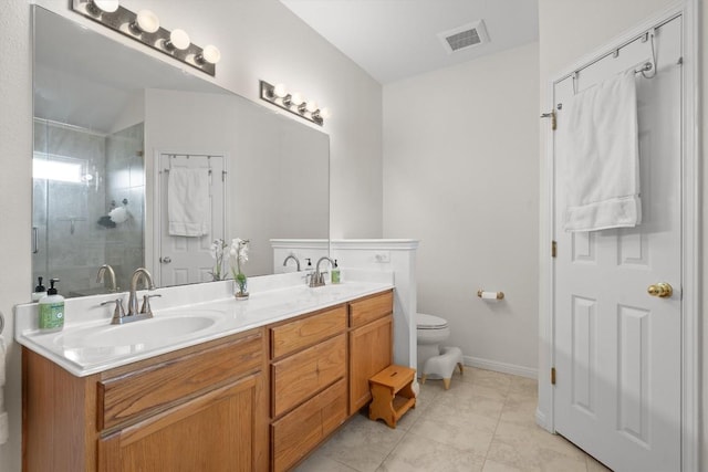 bathroom featuring tile patterned floors, visible vents, a stall shower, a sink, and double vanity