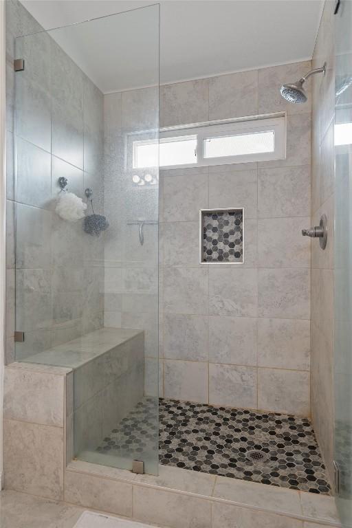 bathroom with a shower stall