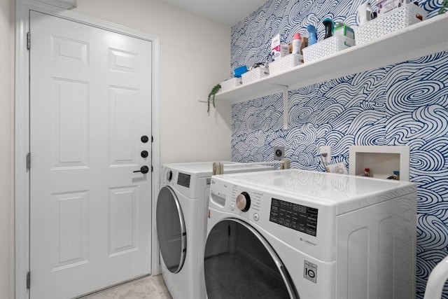 laundry area featuring laundry area and washer and clothes dryer