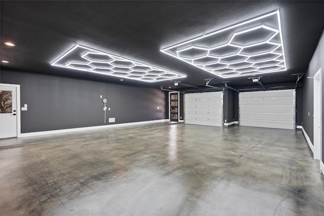 garage with baseboards