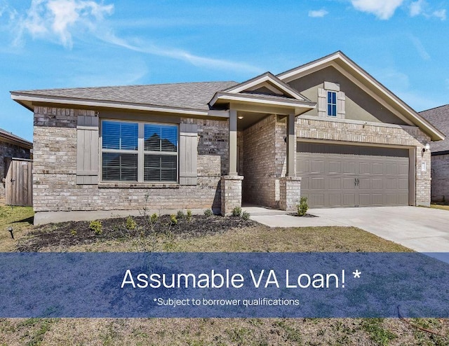 view of front facade featuring a garage, a shingled roof, concrete driveway, and stone siding