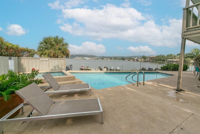 view of pool with a patio, a fenced in pool, and a fenced backyard